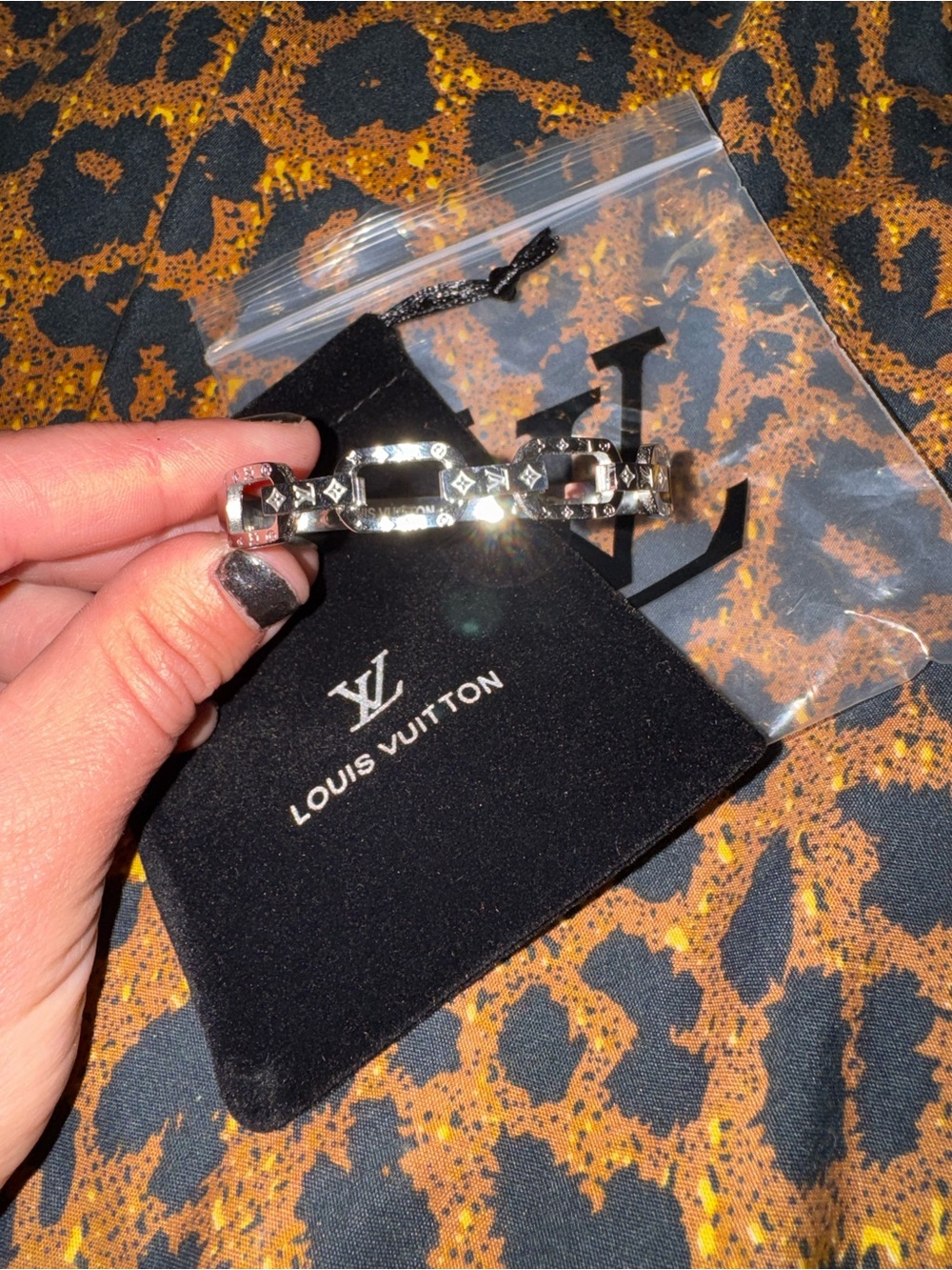 Louis Vuitton Silver Logo Cuff Bracelet - Picture 6 of 8